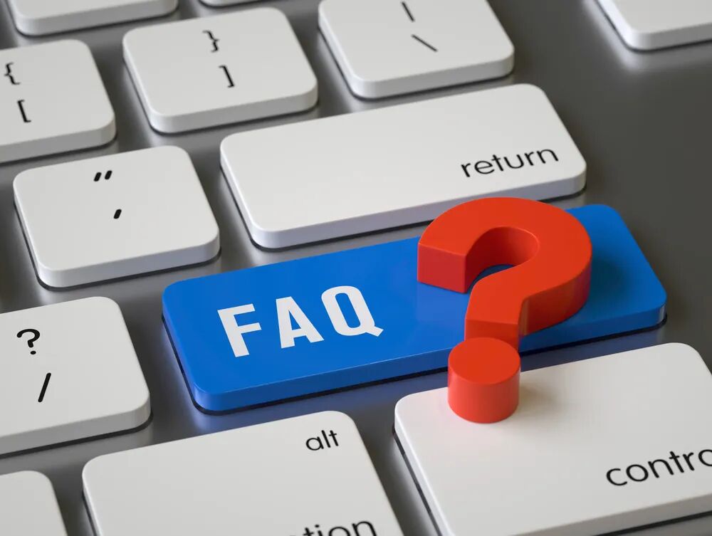 A question mark key on a keyboard, representing questions asked before booking